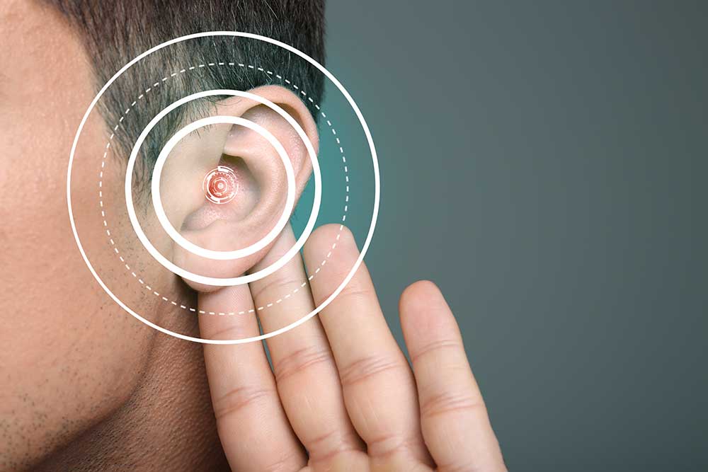 Person using an advanced hearing aid